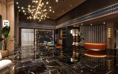 a lobby with a large marble floor and a chandelier at Majestic Residences KLCC By Moonlight in Kuala Lumpur