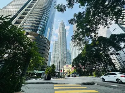a view of a city with tall buildings at Nook Sky Suites KLCC in Kuala Lumpur
