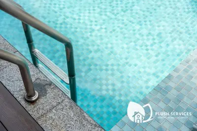 a close up of a swimming pool with a metal railing at Societe Suites Hartamas by Plush in Kuala Lumpur