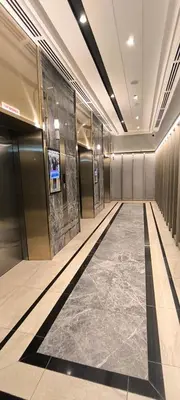 a hallway of an elevator in a building at Service Residence Agile Delima Residence KL in Kuala Lumpur