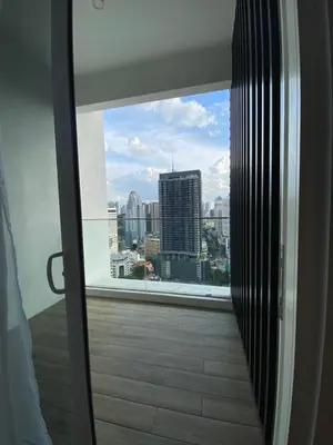 a view of a city skyline from a window at Quill Residence KLCC By UrbanNest in Kuala Lumpur