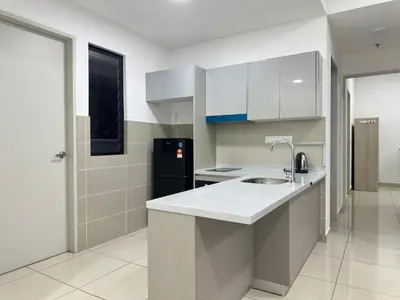 a kitchen with a sink and a refrigerator at Cozy couple suite 1601A at KLCC in Kuala Lumpur