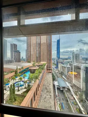 a view of a city from a window of a building at Signature Suite at Time Square by Regal in Kuala Lumpur