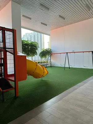 a playground with a slide in a building at PWTC Chamber Rock by AZ Line in Kuala Lumpur