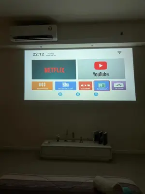 a projection screen with a sink in a bathroom at PWTC Chamber Rock by AZ Line in Kuala Lumpur
