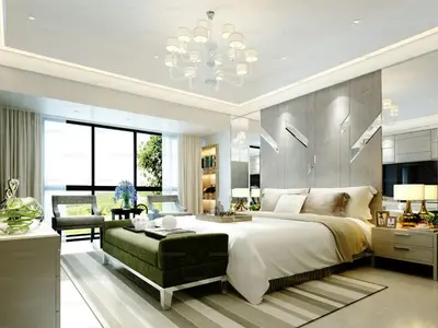a large bedroom with a large bed and a chandelier at Mayavi Property in Kuala Lumpur
