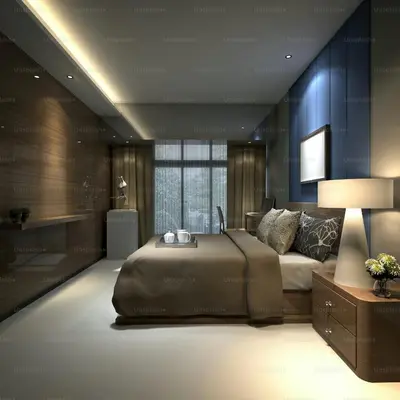a bedroom with a large bed and a blue wall at Mayavi Property in Kuala Lumpur