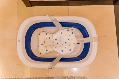 a cake shaped like a heart sitting on a urinal at KidsCastle Dorsett Pavillion in Kuala Lumpur