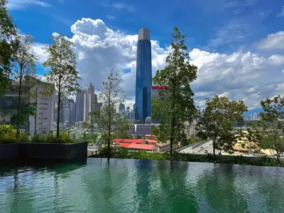 a large body of water with a city in the background at 4BR KLCC View MRT 2min Free Parking Big Unit in Kuala Lumpur