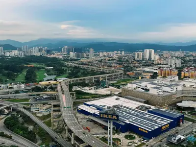 an aerial view of a city with a freeway at 4BR KLCC View MRT 2min Free Parking Big Unit in Kuala Lumpur