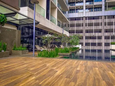 a building with a courtyard with a fountain at 188 Suites by KidsCastle in Kuala Lumpur