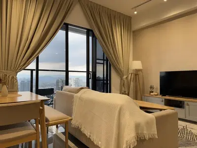 a living room with a couch and a table and a large window at Comfy 1BR klcc view imperial suite B47 09 Trion KL in Kuala Lumpur