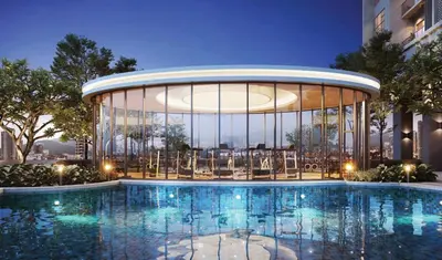 a large building with a pool in front of a building at Comfy 1BR klcc view imperial suite B47 09 Trion KL in Kuala Lumpur