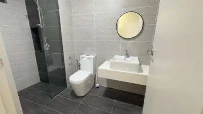 a bathroom with a toilet and a sink and a mirror at Couple home Netflix free parking A45 08St Trion KL in Kuala Lumpur