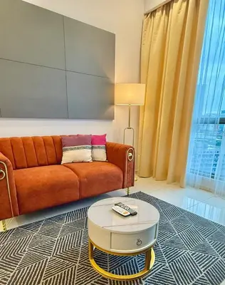 a living room with a couch and a coffee table at Robertson Homefeel 1R1B at Bukit Bintang KL KLCC in Kuala Lumpur