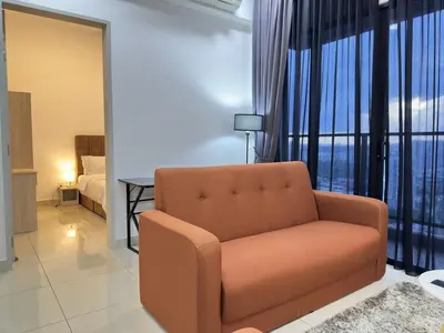 a living room with a couch and a large window at Couple 1BR cozy suite B41 05 Trion KL in Kuala Lumpur