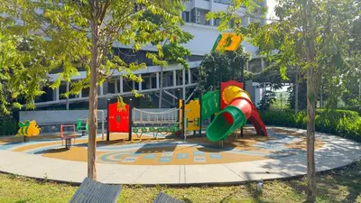 a playground in front of a building at Couple 1BR suite B33 03 free parking Netflix Trion KL in Kuala Lumpur