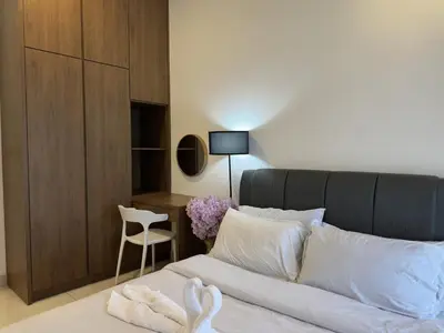 a bedroom with a bed and a desk and a chair at Couple 1BR suite B33 03 free parking Netflix Trion KL in Kuala Lumpur