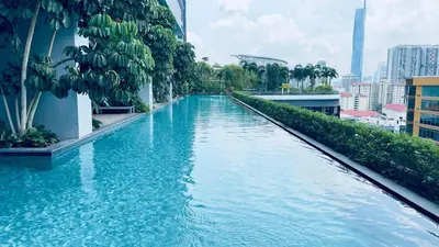 a swimming pool in the middle of a city at Couple Studio Suite A28 07 Trion KL in Kuala Lumpur