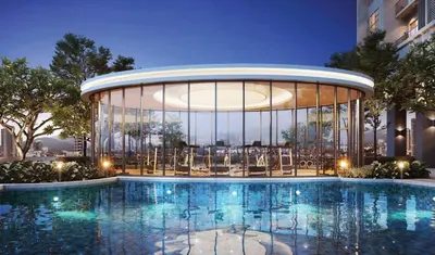 a large building with a pool in front of a building at Couple Studio Suite A28 07 Trion KL in Kuala Lumpur