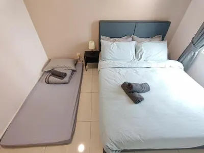 a small bedroom with a bed and a mattress at O 3 Room 200mbps wifi near Mrt Lrt HKL PWTC KLCC in Kuala Lumpur