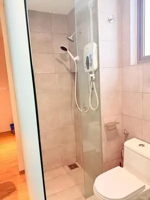a bathroom with a shower with a toilet at The Sentral Nook KL Sentral By Riveria city in Kuala Lumpur