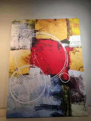 a painting of a red object on a wall at Neu Suites in Kuala Lumpur