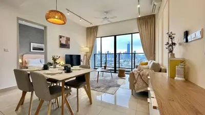 a living room with a dining table and a living room with a view at Trion KL By AlwaysHome in Kuala Lumpur