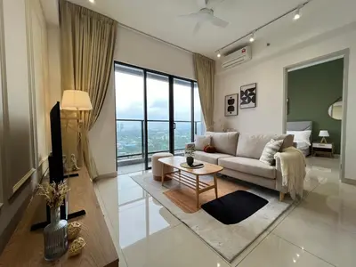 a living room with a couch and a table at Trion KL By AlwaysHome in Kuala Lumpur