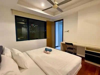 a bedroom with a bed with a hat on it at 0710 Sweet Home-Casa Residency 2R 2B in Kuala Lumpur