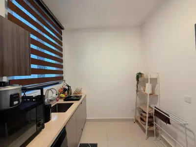 a kitchen with a sink and a counter top at 2BR with Balcony High Floor, Henna Residence Near LRT Sri Rampai & Wangsa Walk Mall in Kuala Lumpur