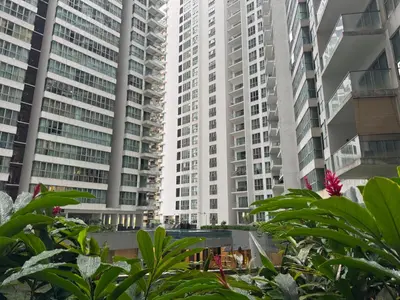 two tall buildings in a city with plants at Regalia KLCC Pavilion Ceylon Jalan Alor 8 PAX 2R2B in Kuala Lumpur