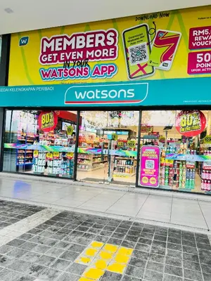 a store with signs on the front of a store at M City by Celestia Suites in Kuala Lumpur
