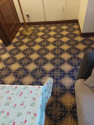 a living room with a mattress on the floor and a room with a carpet at kl Dreamx service suite at times square in Kuala Lumpur