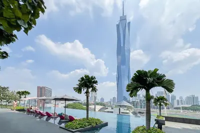 a view of the burj khalifa from the infinity pool of the sh at Contemporary Apartment KL with 3 Bedrooms in Kuala Lumpur
