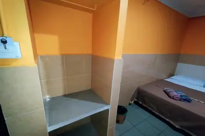a small room with a small bed in a room at 98 Inn BilikXpert at Chow Kit in Kuala Lumpur