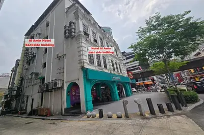 a building on the side of a city street at Hotel AL Amin in Kuala Lumpur