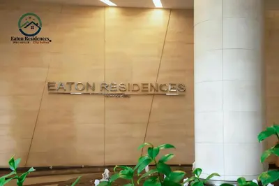 a sign on the side of a wall in a building at Eaton Residence City Suites in Kuala Lumpur