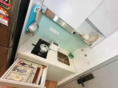 an overhead view of a kitchen with a stove at KL Sentral Monorail 4 pax Kuala Lumpur, Sky Pool Family Merdeka 118 Nice View in Kuala Lumpur