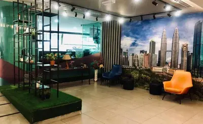 a lobby with a mural of a city at Taragon Putri Bintang in Kuala Lumpur