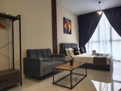 a bedroom with a bed and a couch and a table at Majestic Residence Suites KLCC by Homebrickz in Kuala Lumpur