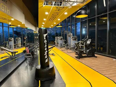 a gym with treadmills and machines in a building at Neu Suites by Serenity Luxe Suites in Kuala Lumpur