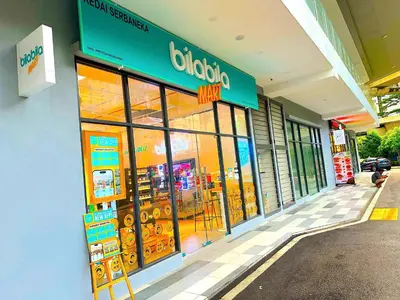 a buicks store with a sign on the side of a building at Neu Suites by Serenity Luxe Suites in Kuala Lumpur
