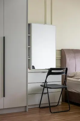 a black chair in a room with a window at SV001 Maluri - Sunway Velocity - Cheras Stay in Kuala Lumpur