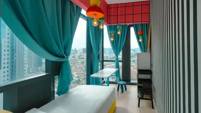 a bedroom with a bed and a large window at Star KLCC Comfort Suite 3-4pax in Kuala Lumpur