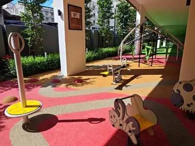 a room with a playground with a pink carpet at KLCC View City Center At Majestic residence in Kuala Lumpur