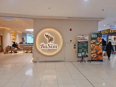 a ritzimus sign on a wall in a shopping mall at KLCC View City Center At Majestic residence in Kuala Lumpur