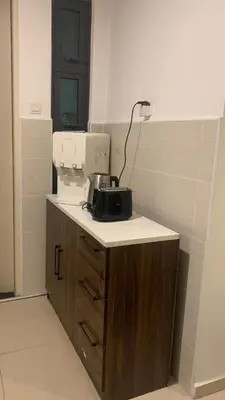 a machine on a counter in a room at Cozy Stay at Legasi 5 min Walking distance to KLCC 2 in Kuala Lumpur