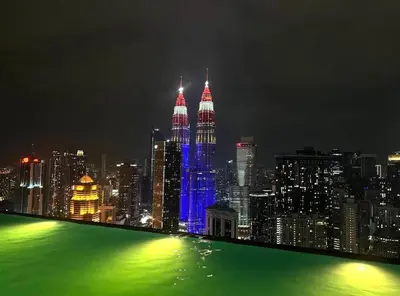 a view of a city skyline at night at The Platinum KLCC By Elegant Suites in Kuala Lumpur