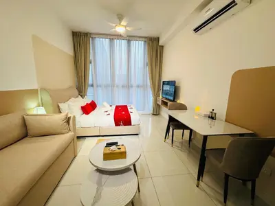 a living room with a couch and a bed at Majestic Residence Kuala Lumpur City Centre in Kuala Lumpur